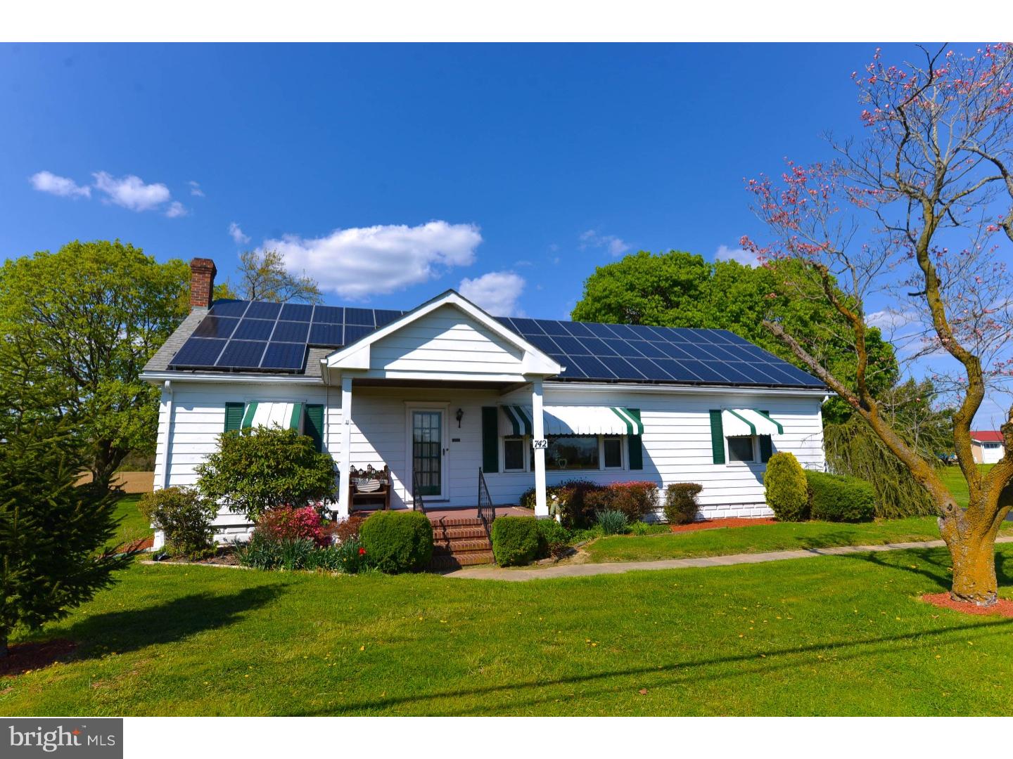 742 Salem Quinton Road Quinton, NJ 08079 - Photo 2 of 23 a front view of a house with a yard