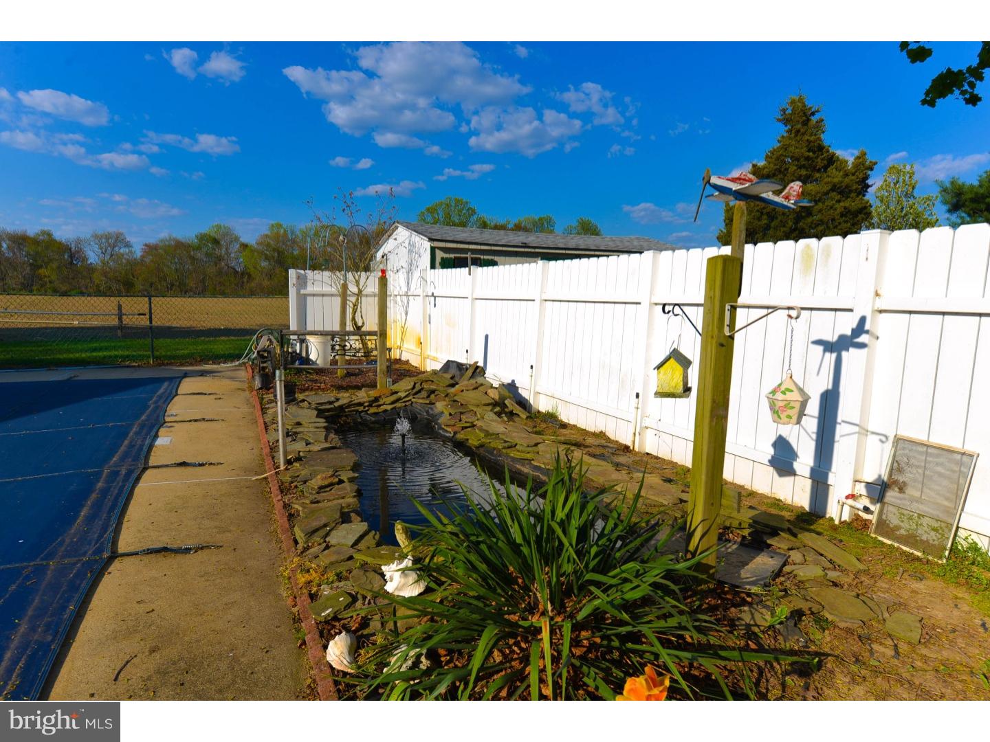 742 Salem Quinton Road Quinton, NJ 08079 - Photo 22 of 23 a view of a swimming pool with a yard
