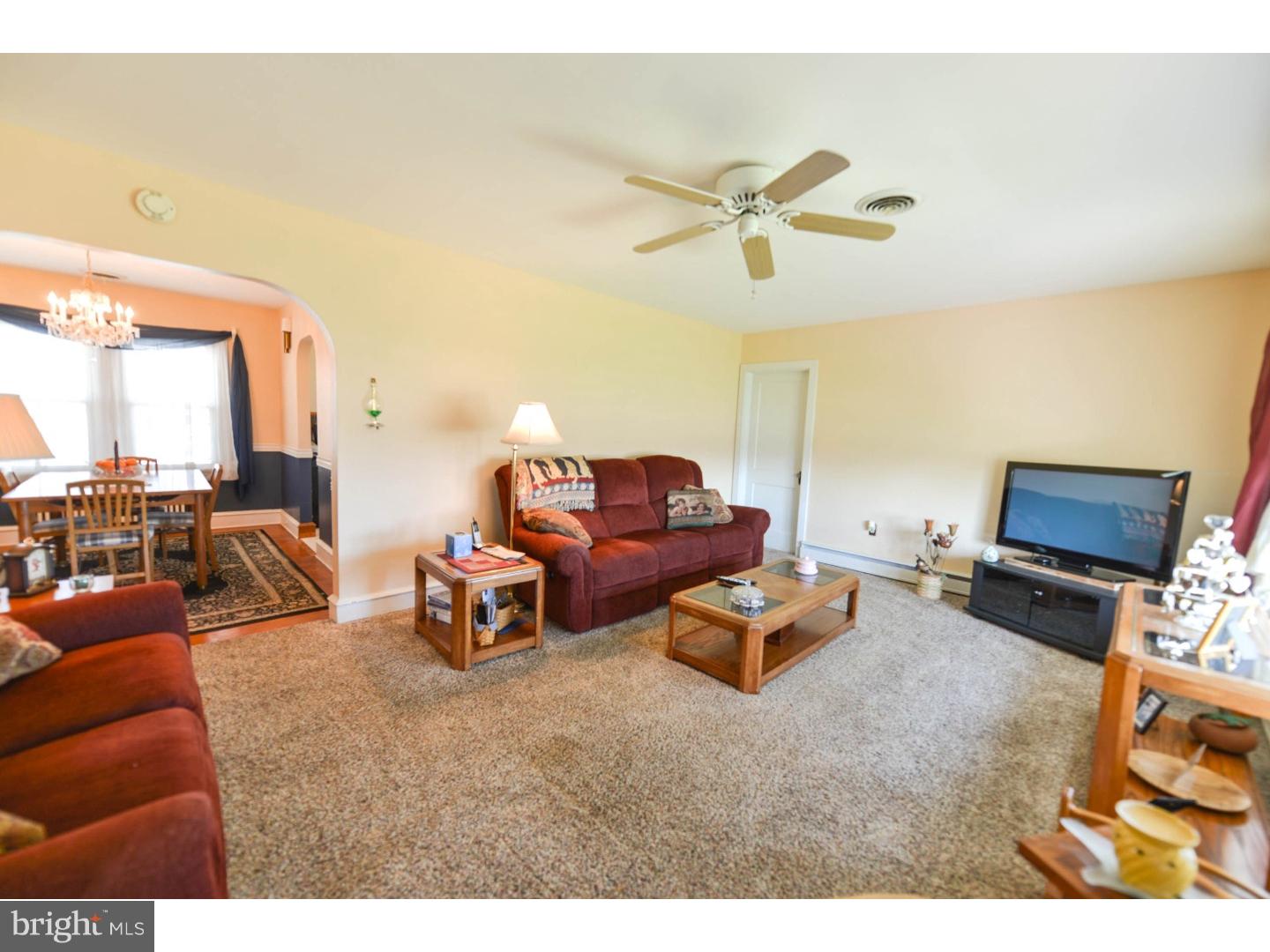 742 Salem Quinton Road Quinton, NJ 08079 - Photo 7 of 23 a living room with furniture and a flat screen tv