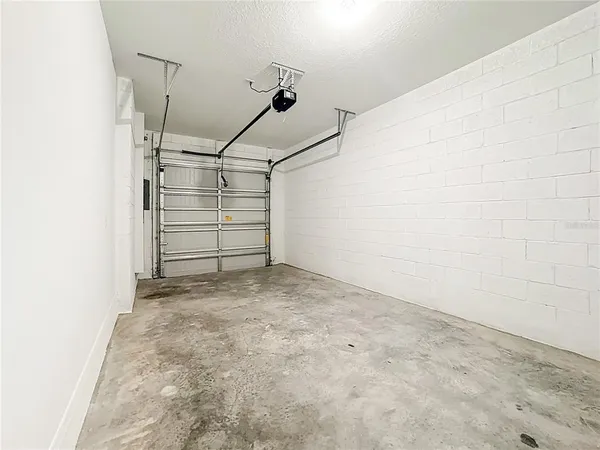 a view of a house with porch and furniture