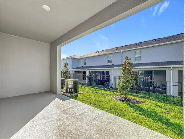 a front view of a house with yard