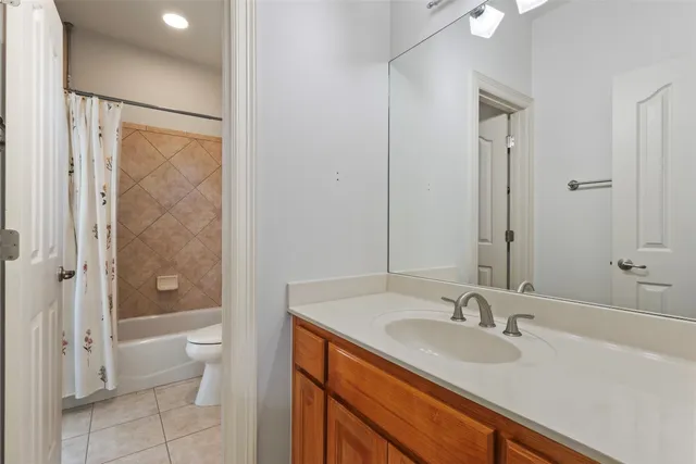 a bathroom with a toilet and a bathtub