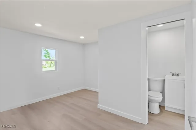 a view of a bathroom with toilet
