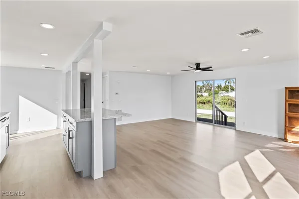 a view of entryway with wooden floor