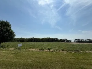 a view of a lake with a city