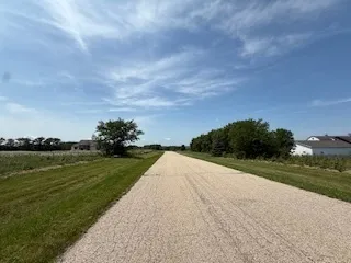 a view of a lake with a big yard