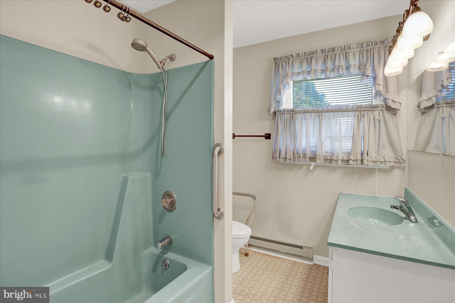 156 Chester Street Carlisle, PA 17013 - Photo 22 of 36 a bathroom with a sink a toilet and shower