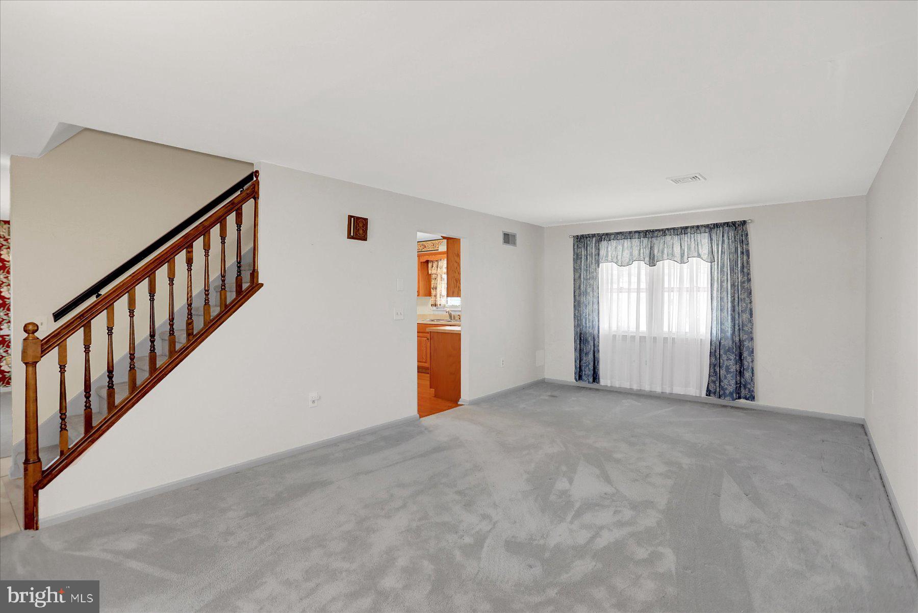 156 Chester Street Carlisle, PA 17013 - Photo 7 of 36 a view of an empty room with windows