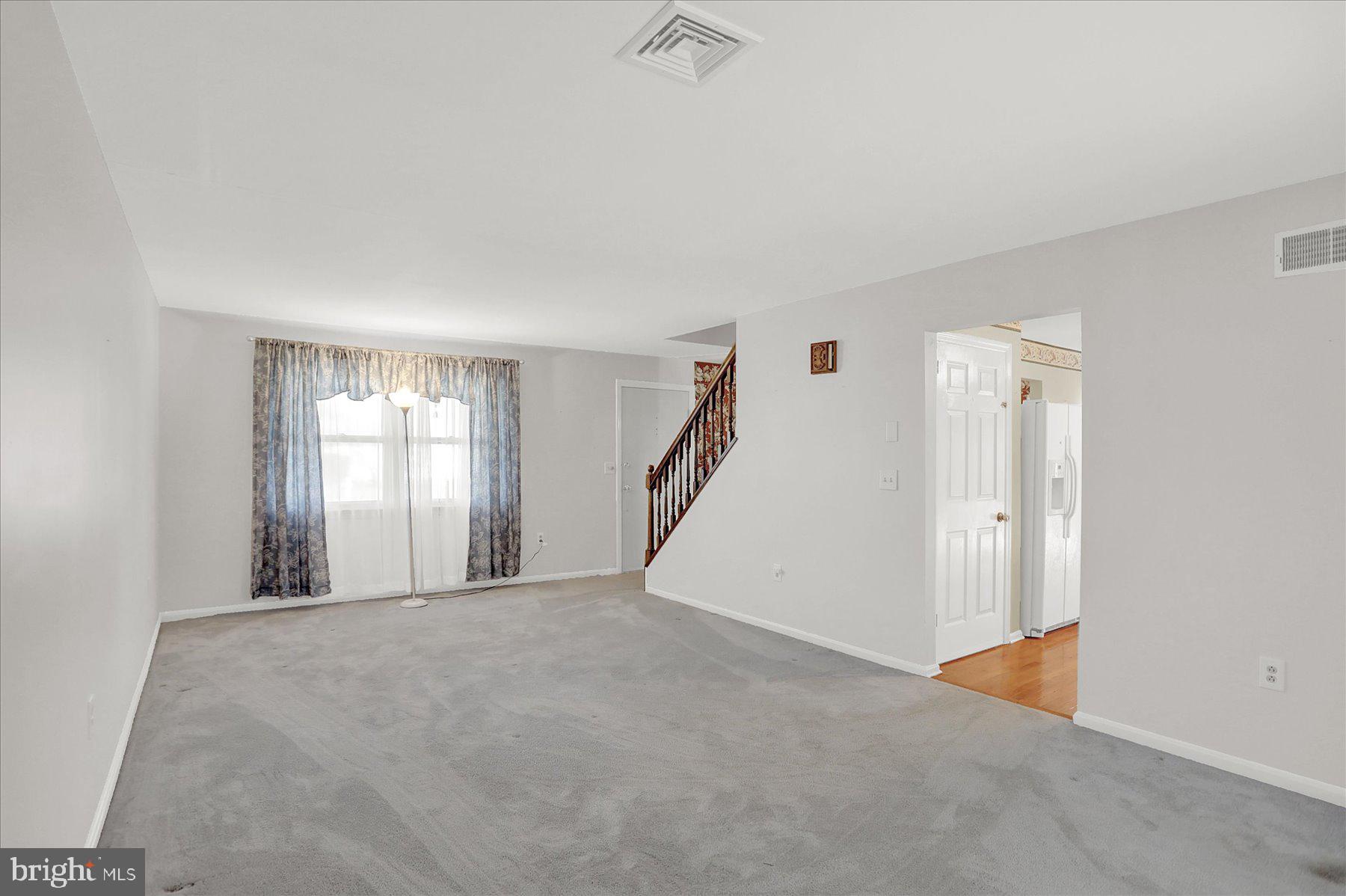 156 Chester Street Carlisle, PA 17013 - Photo 8 of 36 a view of an empty room with a window