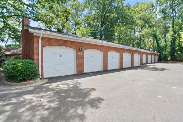 a backyard of a house with garage