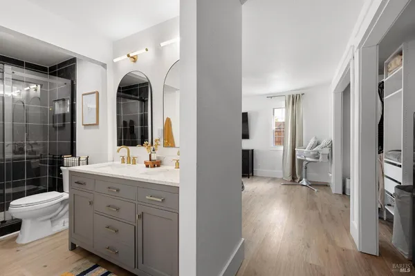 a view of bathroom with dual sinks