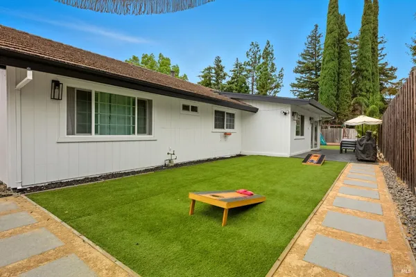 a house view with a garden space