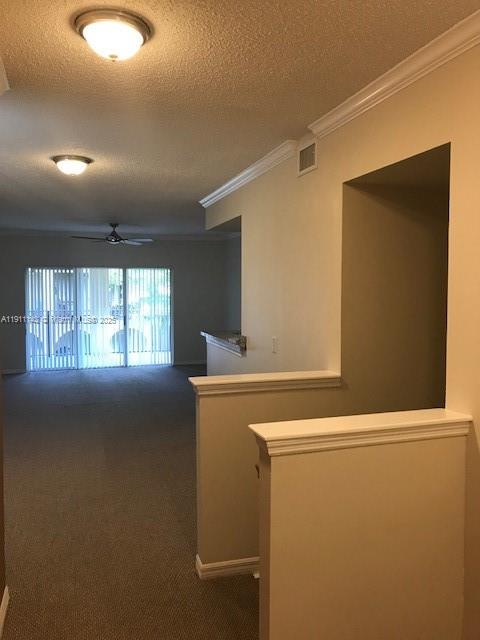 2469 Centergate Drive, Unit 203 Miramar, FL 33025 - Photo 5 of 13 a utility room with dryer and washer