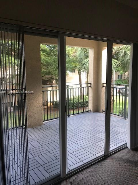 2469 Centergate Drive, Unit 203 Miramar, FL 33025 - Photo 7 of 13 a view of porch with a porch