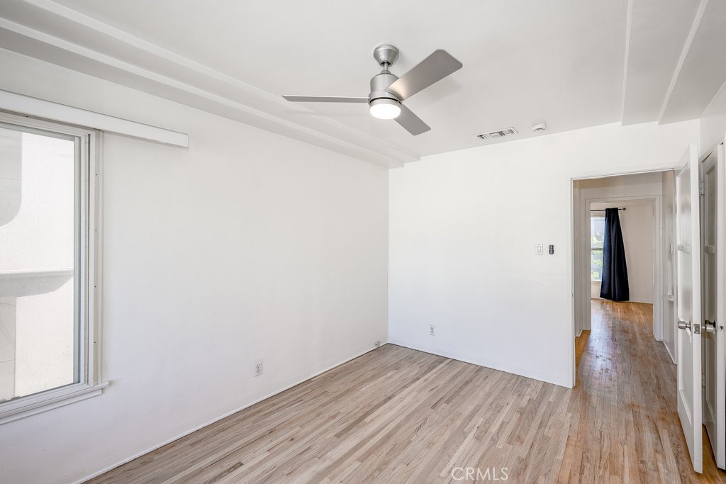 711 North Howard Street Glendale, CA 91206 - Photo 15 of 20 a view of a room with wooden floor closet and windows