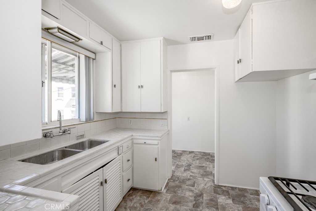 711 North Howard Street Glendale, CA 91206 - Photo 7 of 20 a view of a kitchen with a sink