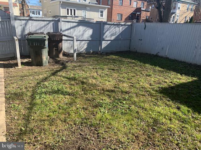 554 Newcomb Street Southeast, Unit 4 Washington, DC 20032 - Photo 34 of 34 a backyard of a house