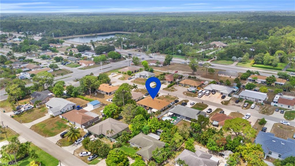 2388 55th Terrace Southwest Naples, FL 34116 - Photo 41 of 42 Drone / aerial view with a water view