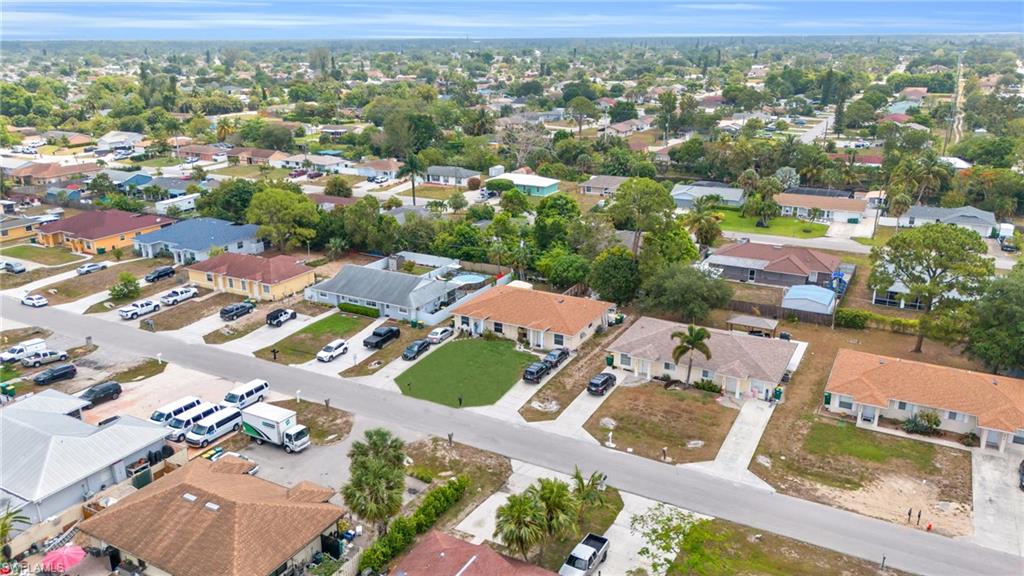 2388 55th Terrace Southwest Naples, FL 34116 - Photo 5 of 42 View of drone / aerial view
