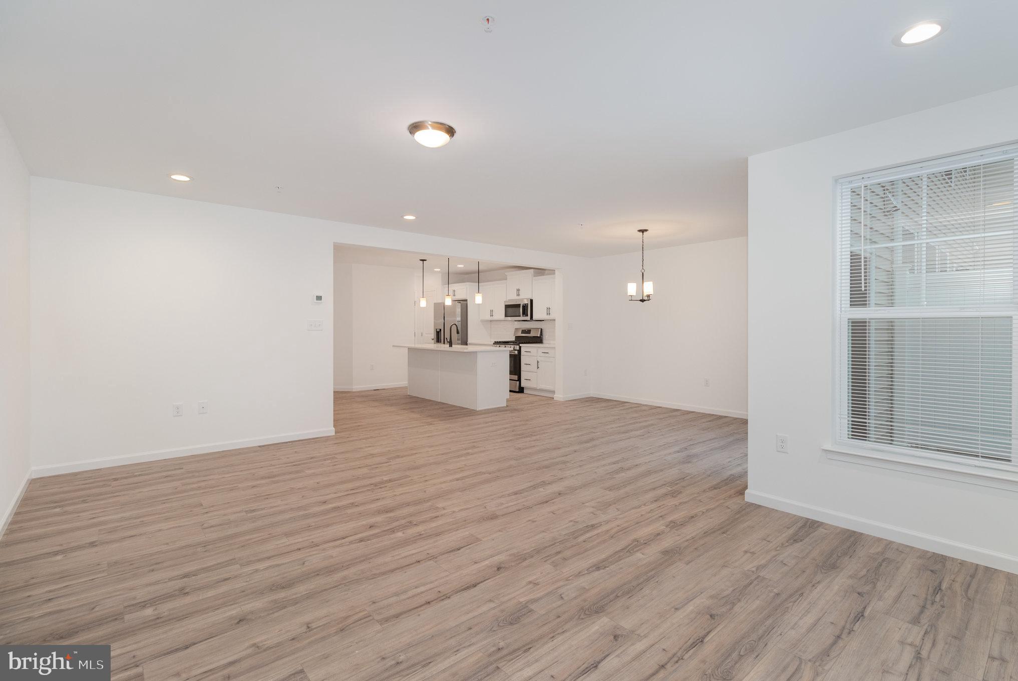 104 Emma Circle Harrisburg, PA 17112 - Photo 11 of 29 a view of empty room with wooden floor