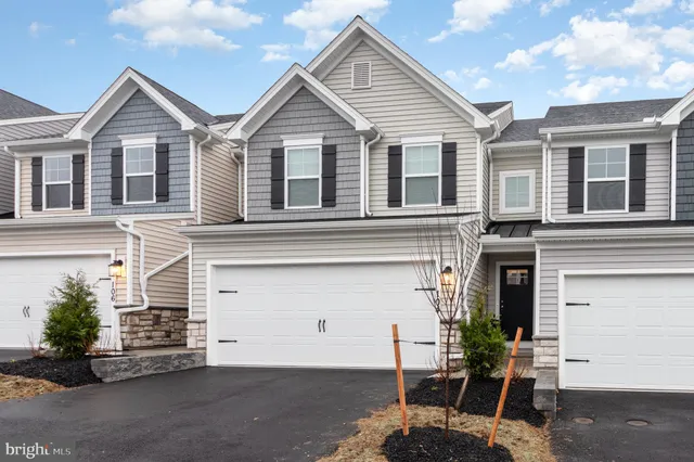 front view of a house with a garage