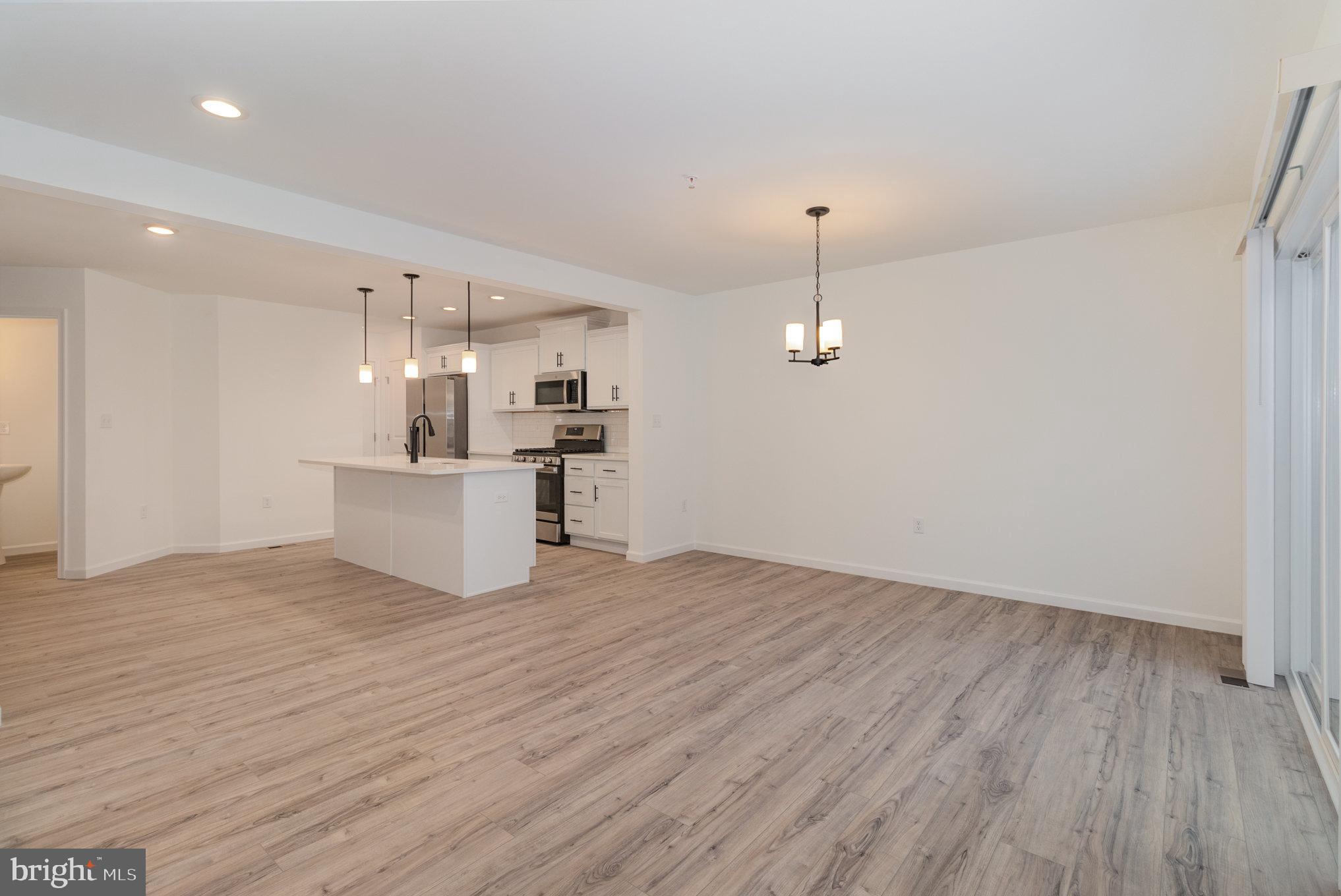 104 Emma Circle Harrisburg, PA 17112 - Photo 9 of 29 a view of a kitchen with wooden floor and a sink