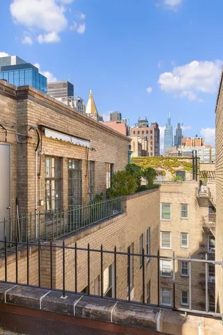a building with trees in front of it