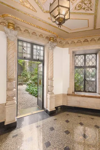 a view of a house with a street