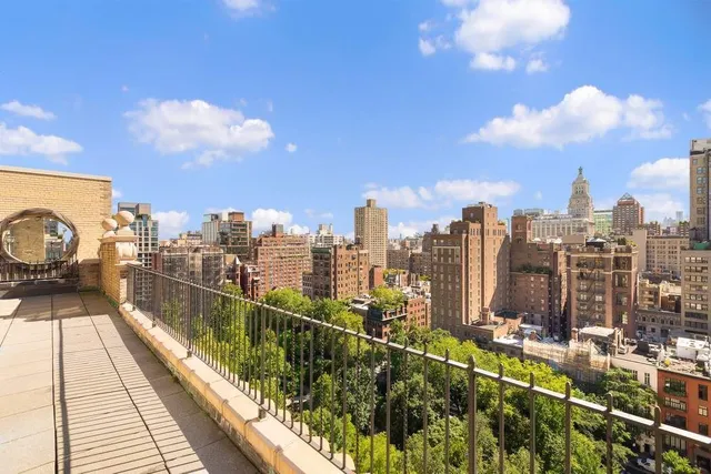 a view of a city with tall buildings