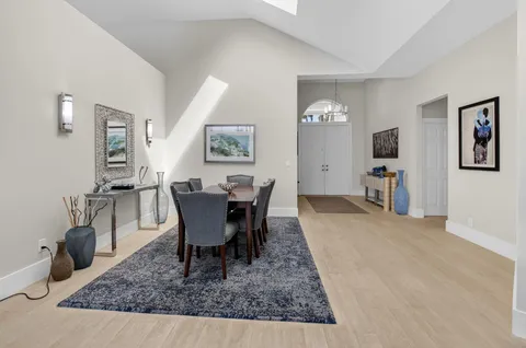 a view of a dining room with furniture