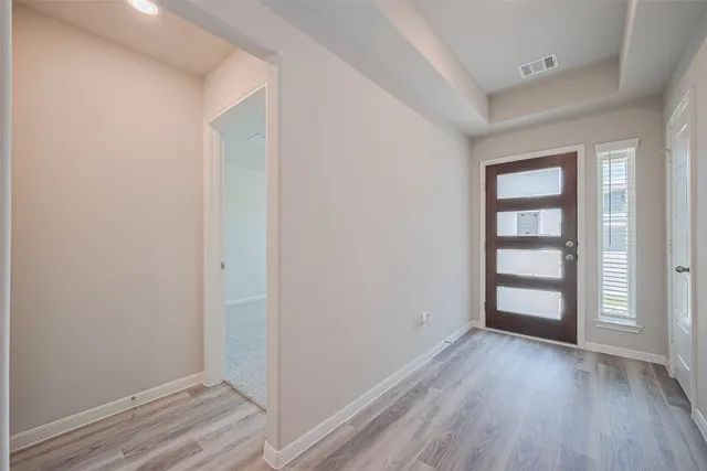 wooden floor and window in a room
