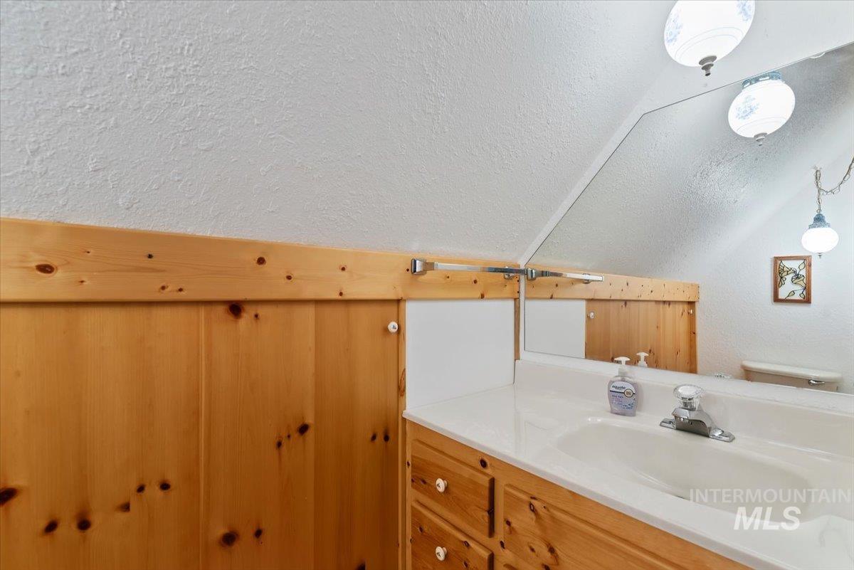 44 Ridgeview Drive Cascade, ID 83611 - Photo 19 of 29 Bathroom featuring vanity and a textured wall