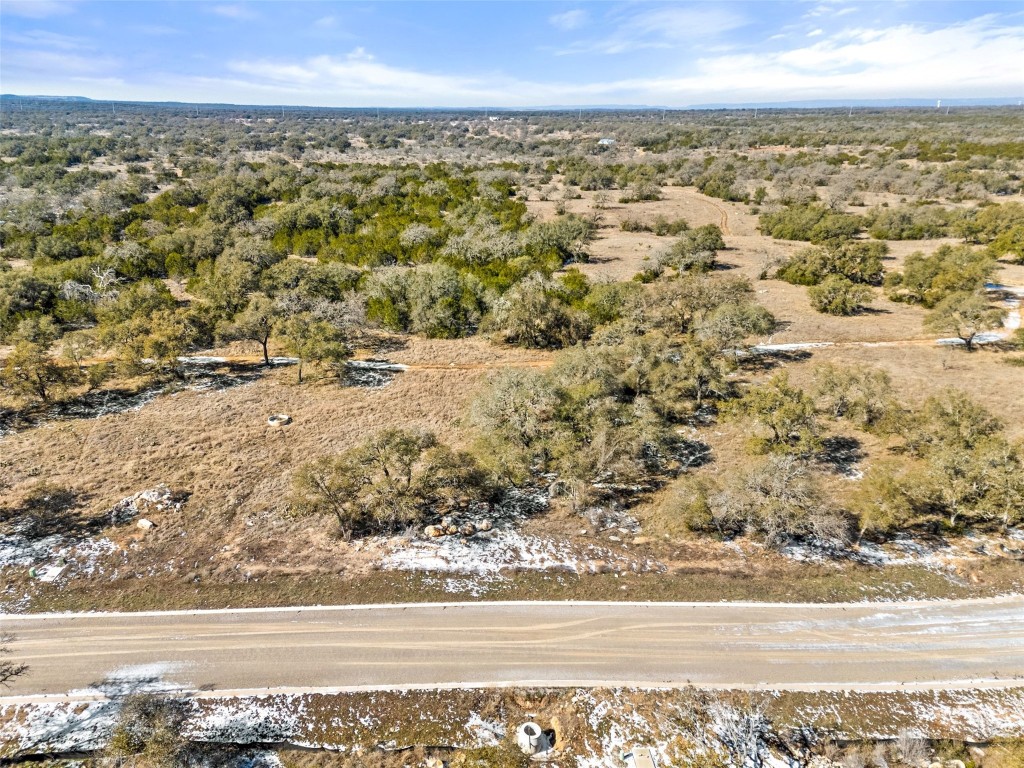 145 Red Hawk Drive Marble Falls, TX 78654 - Photo 1 of 30 an aerial view of beach and residential building and ocean
