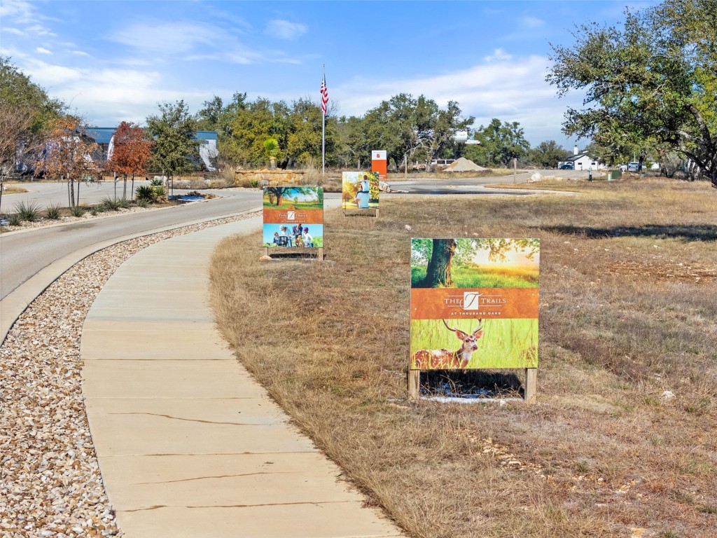 145 Red Hawk Drive Marble Falls, TX 78654 - Photo 10 of 30 a view of a swimming pool and a yard