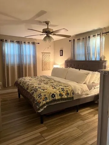 a white toilet sitting next to a small bathroom