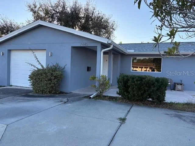 a view of a balcony with chairs