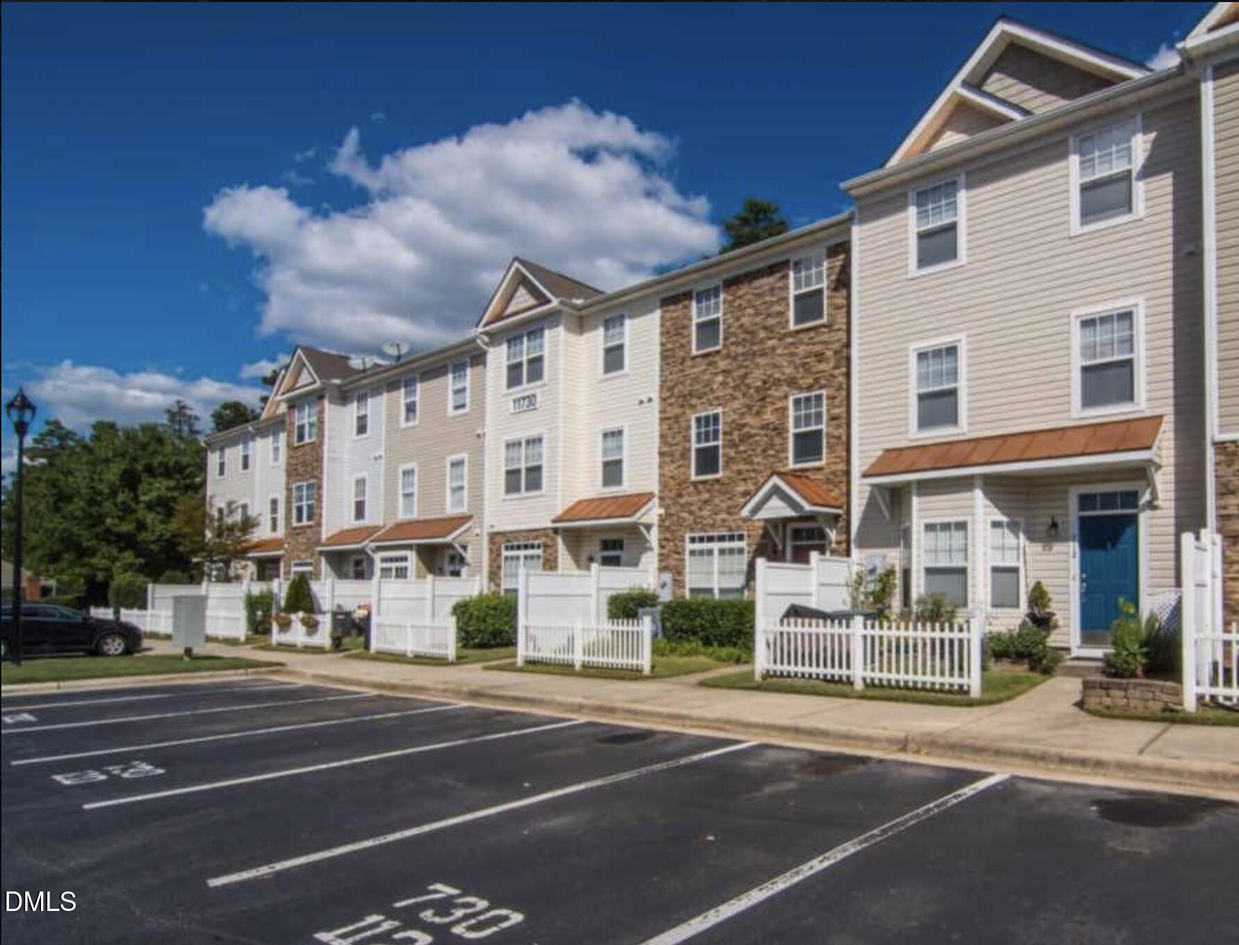 a view of a building with a street