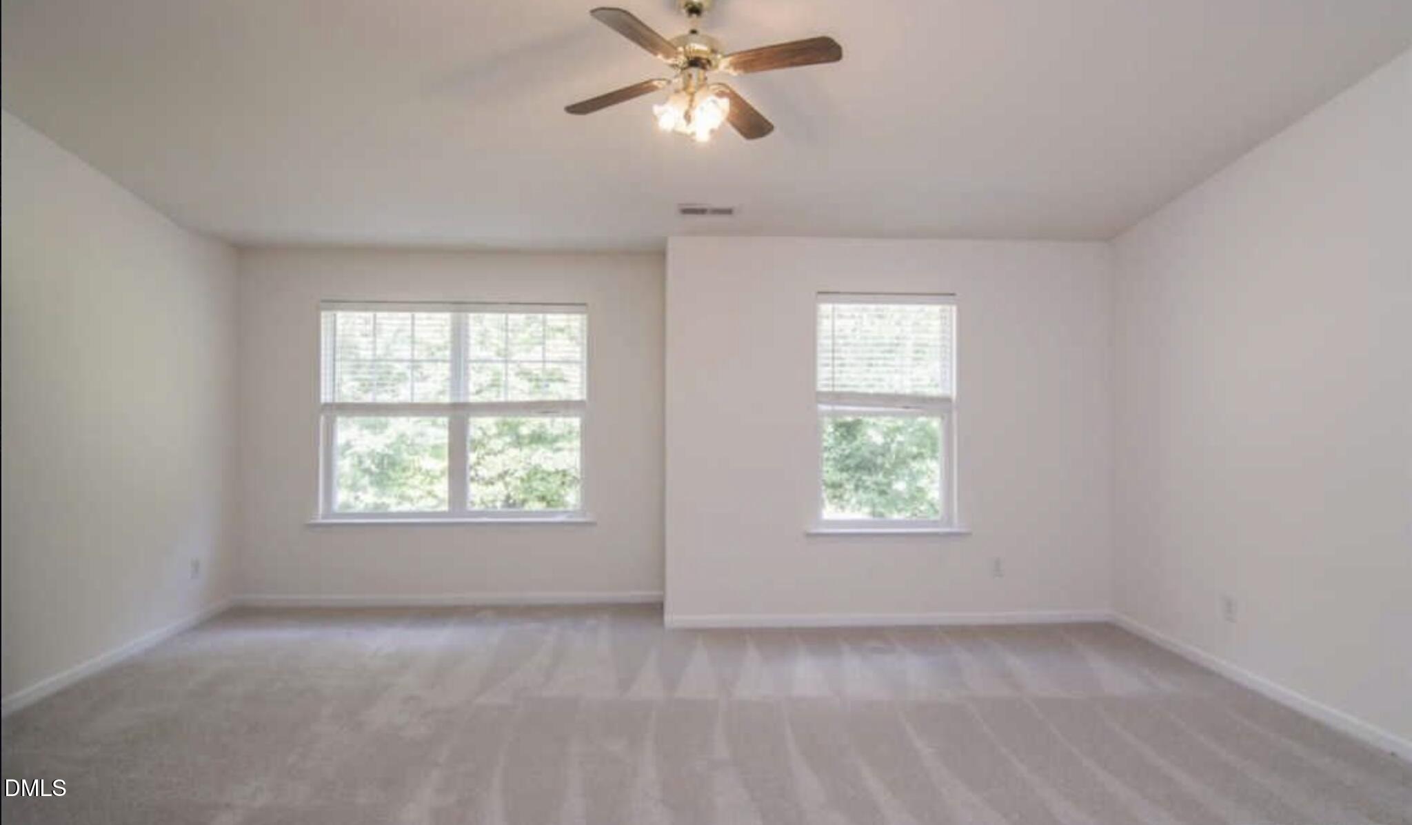 11730 Mezzanine Drive Raleigh, NC 27614 - Photo 11 of 11 a view of an empty room with a window