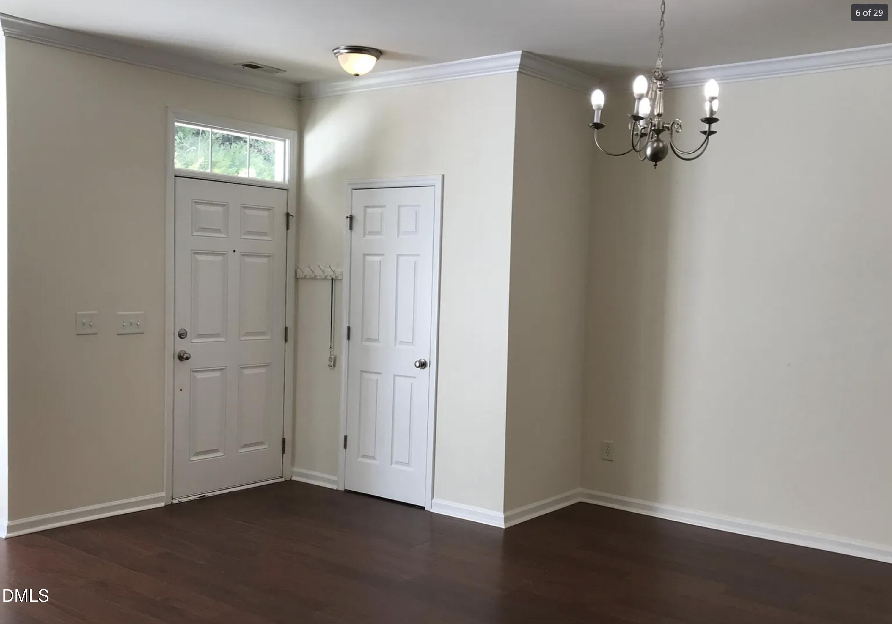 11730 Mezzanine Drive Raleigh, NC 27614 - Photo 6 of 11 a view of a chandelier in big room and chandelier in a room