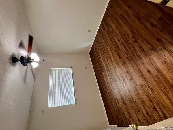 a view of staircase with white walls