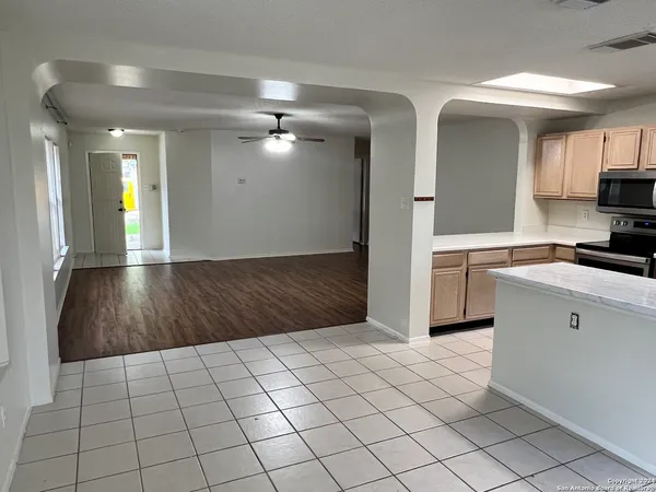 a view of an empty room and window