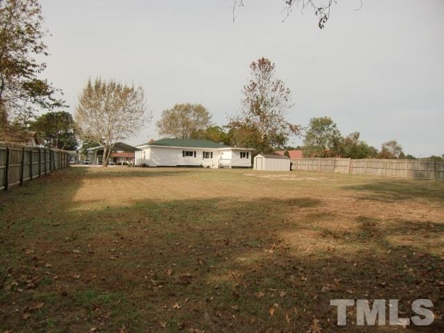 302 Jackson Road Dunn, NC 28334 - Photo 21 of 25 View of home from the rear property line