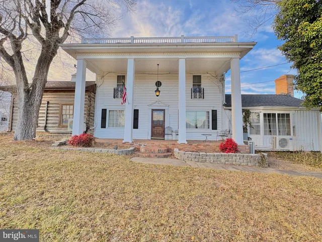 front view of a house with a small yard