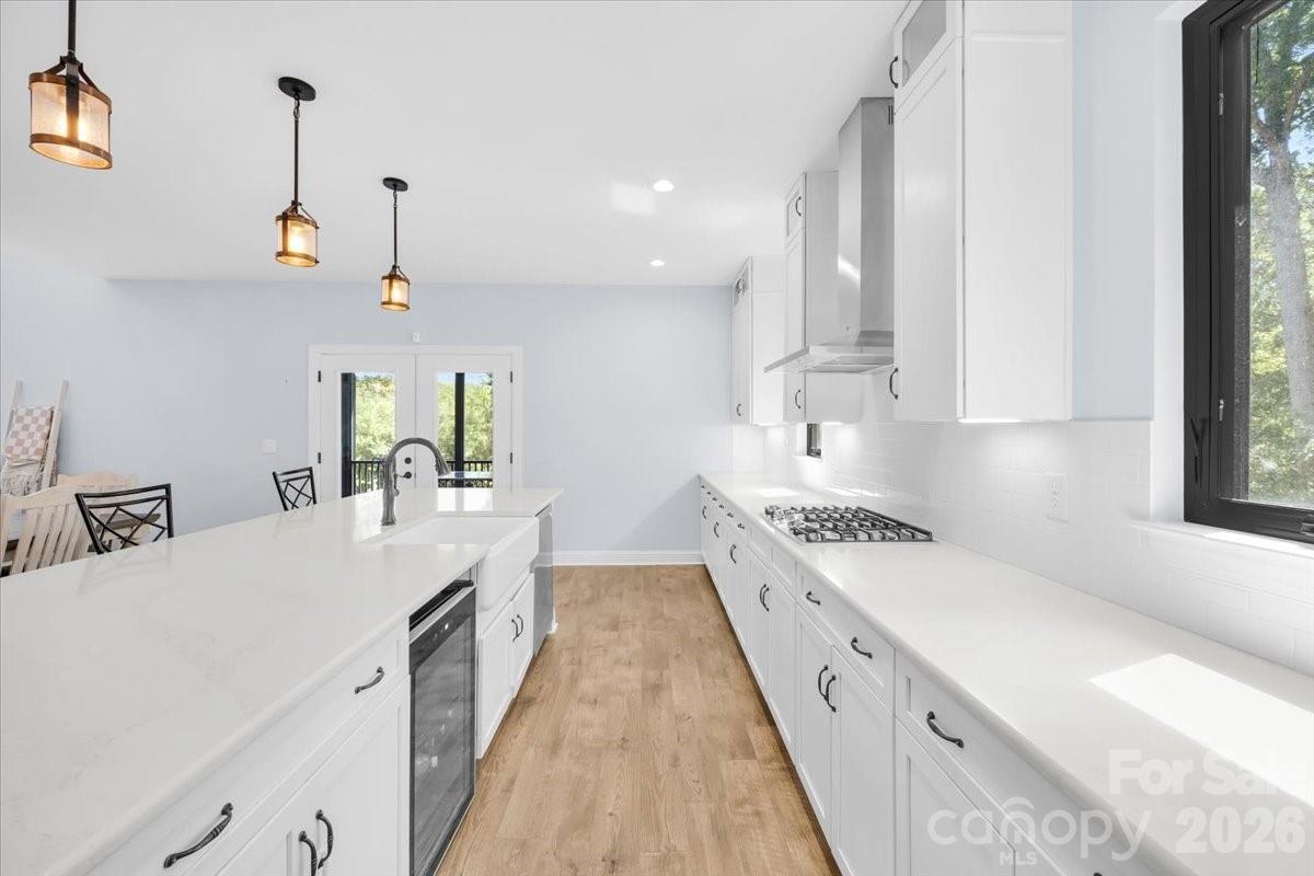 1194 99 Island Road Blacksburg, SC 29702 - Photo 14 of 47 a large white kitchen with a large window