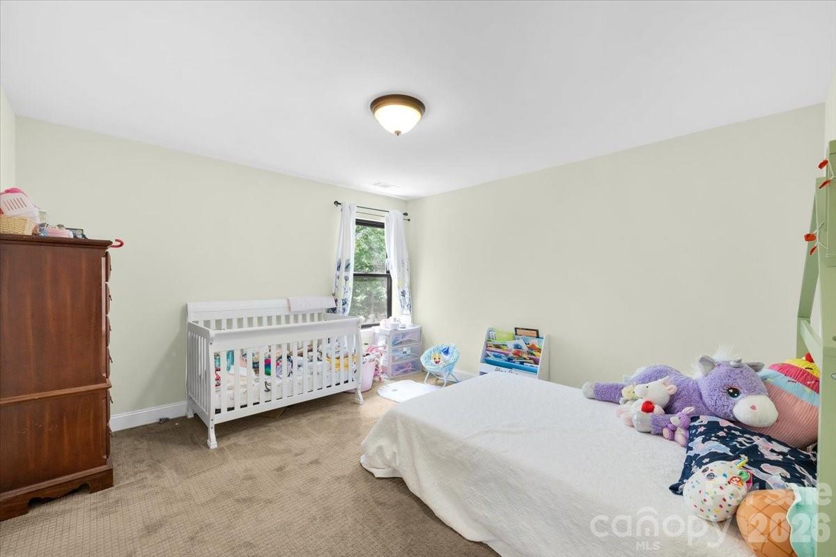 1194 99 Island Road Blacksburg, SC 29702 - Photo 16 of 47 a bedroom with a bed and a window
