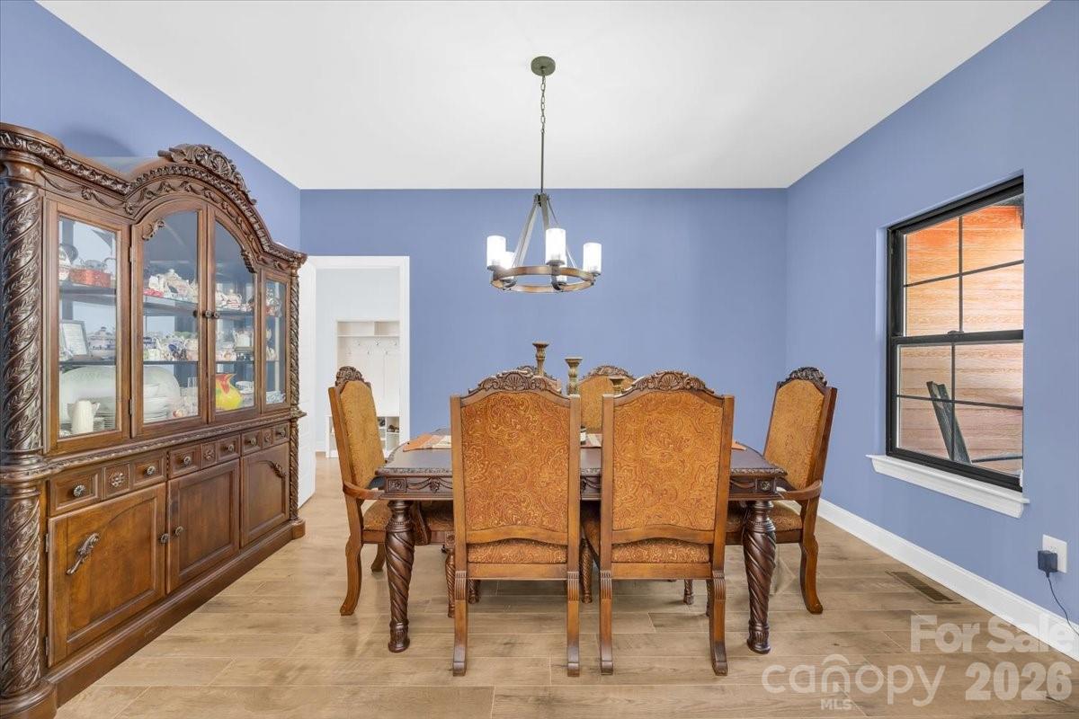 1194 99 Island Road Blacksburg, SC 29702 - Photo 20 of 47 a dining room with furniture and window