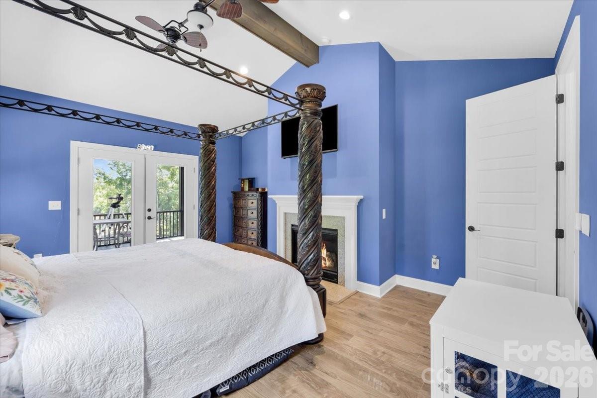 1194 99 Island Road Blacksburg, SC 29702 - Photo 27 of 47 a bedroom with a bed and a large mirror on the dresser