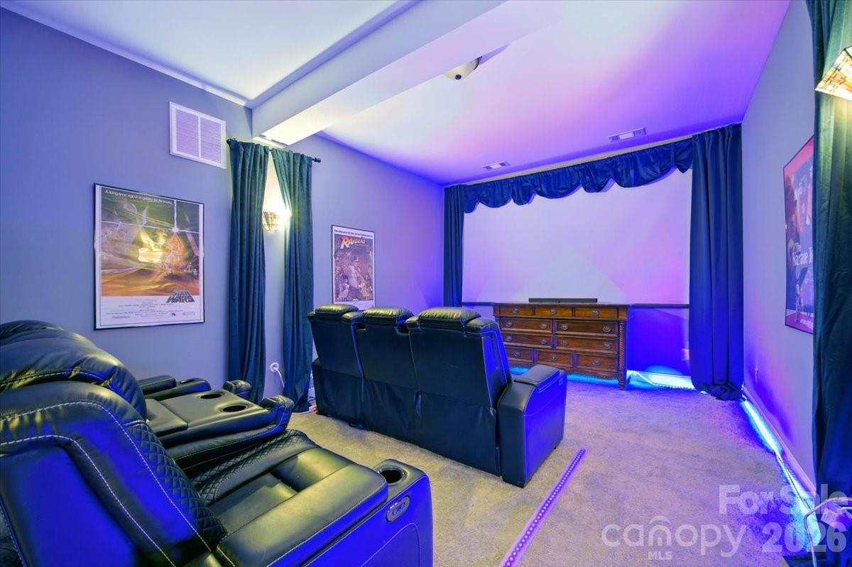 1194 99 Island Road Blacksburg, SC 29702 - Photo 35 of 47 a bedroom with red walls and a dresser