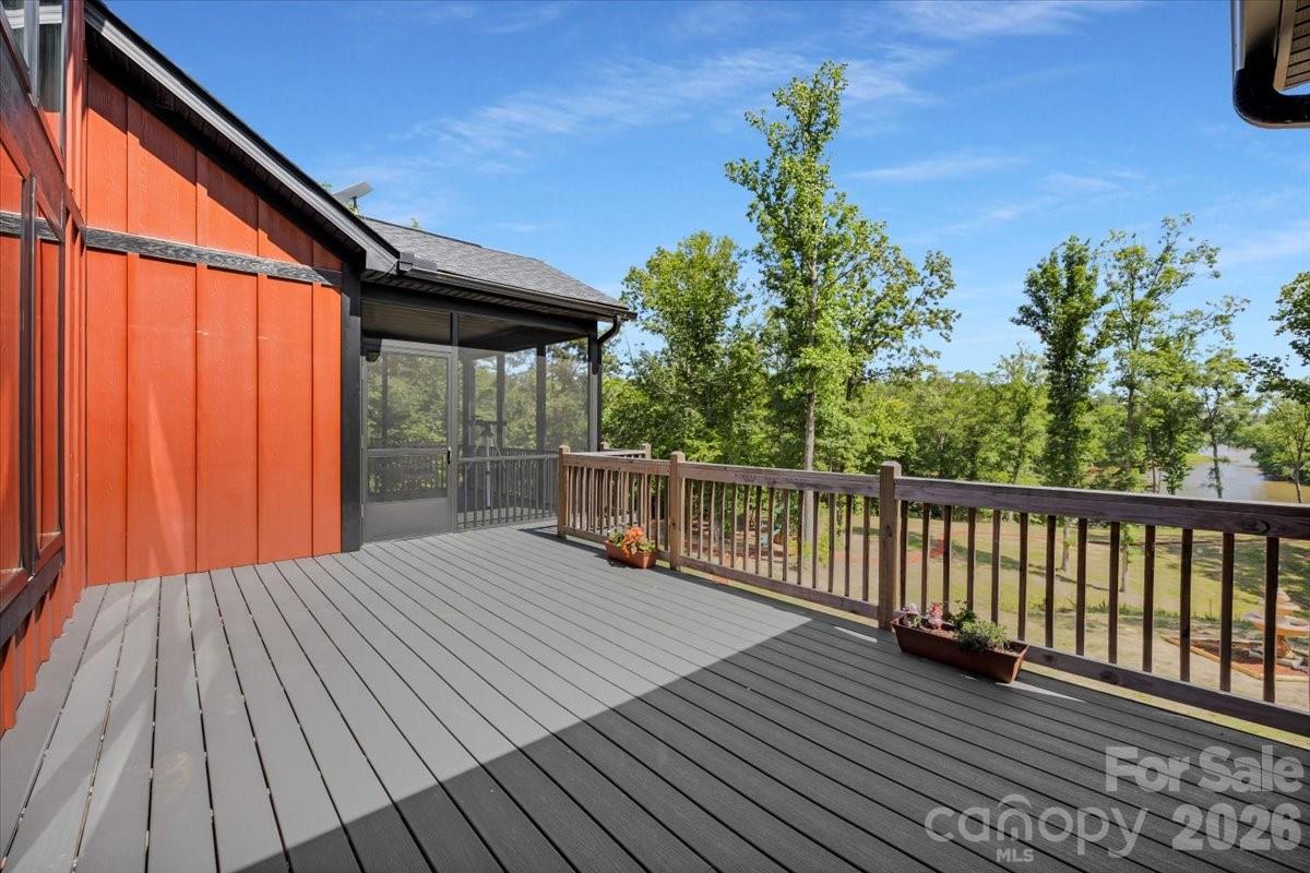 1194 99 Island Road Blacksburg, SC 29702 - Photo 37 of 47 a balcony with wooden floor and fence