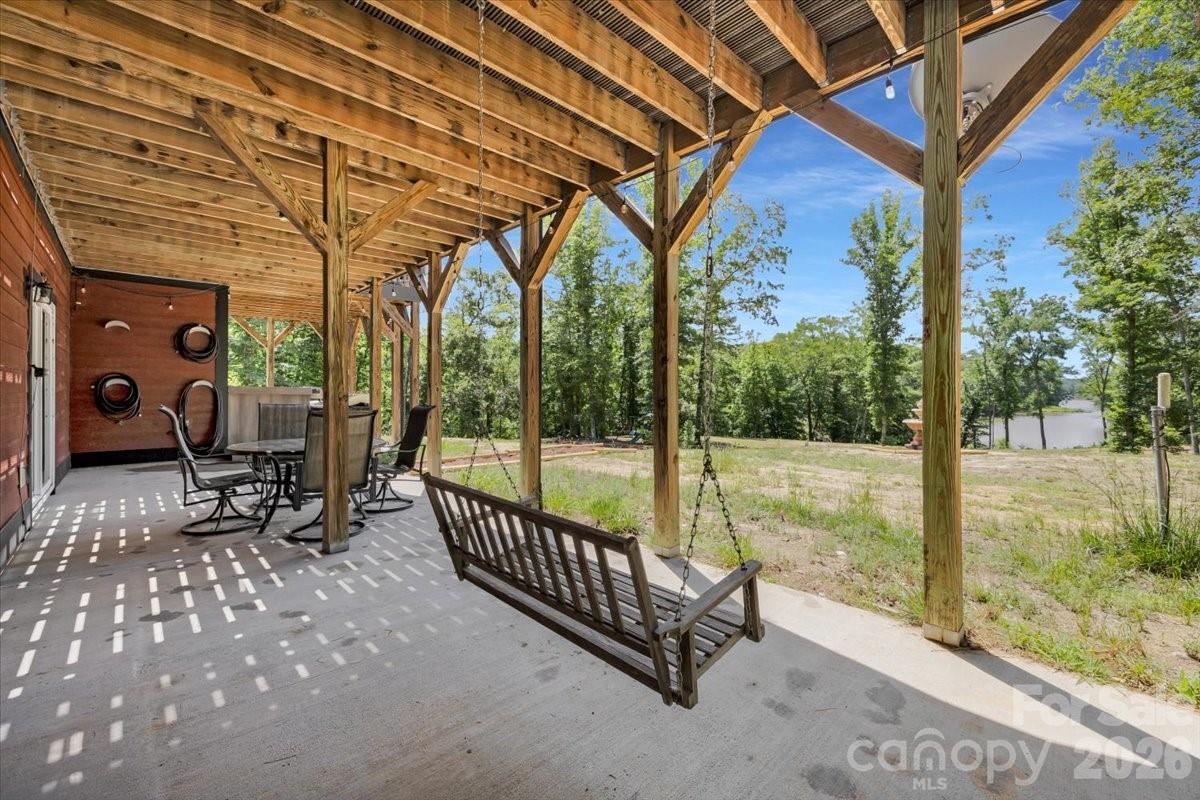 1194 99 Island Road Blacksburg, SC 29702 - Photo 39 of 47 a view of a porch with chairs and backyard